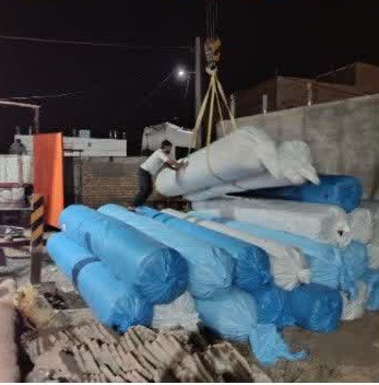 ورود رولهای چمن مصنوعی پروژه بزرگ ورزشی عطاملک جوینی به شهر نقاب