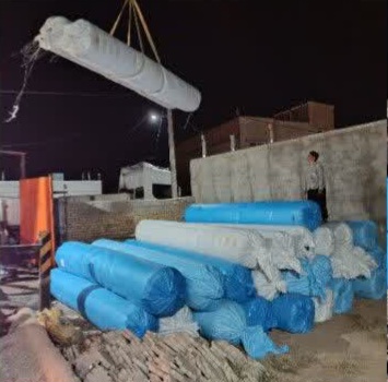 ورود رولهای چمن مصنوعی پروژه بزرگ ورزشی عطاملک جوینی به شهر نقاب